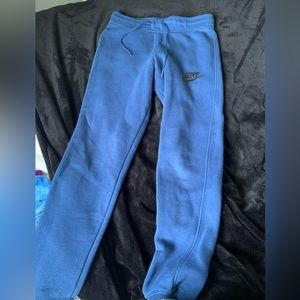 navy blue Nike sweat pants